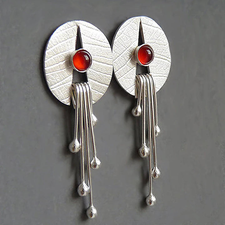 Boucles d'oreilles en pierre creuse rouge suspendues